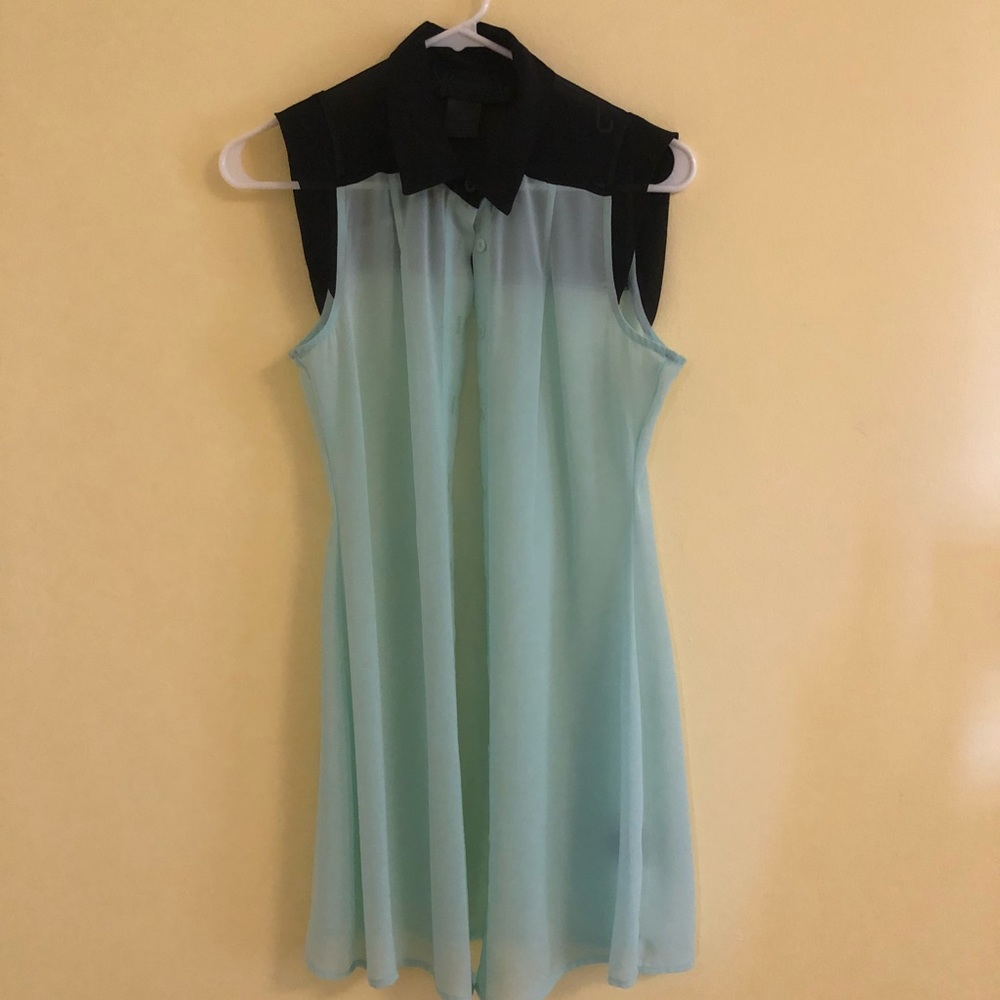Kardashian’s kollection mint green and black tunic